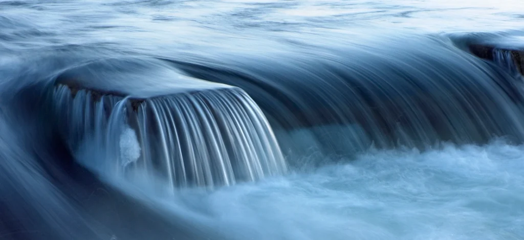 water flowing over rocks